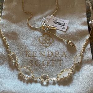 Kendra Scott gold and clear necklace.